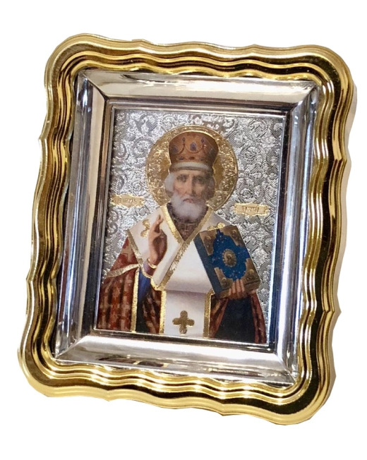 Икона в киоте пласт золоч. 6х7 см.